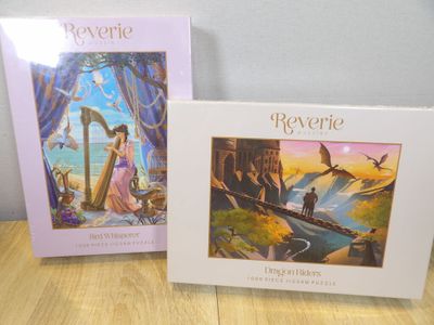 two books on a table with a picture of a woman and a man