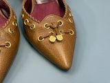 a close up of a pair of shoes on a table