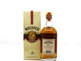 a bottle of whiskey sitting next to a box on a white surface