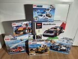 many legos that are sitting on the floor