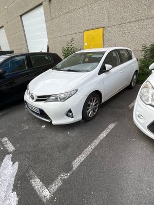 three cars parked in a parking lot next to each other