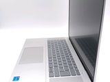 a laptop computer that is sitting on a white surface