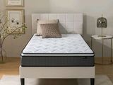 a picture of a mattress in a bedroom with a pillow on it
