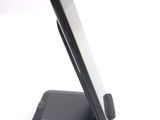 a cell phone that is sitting on top of a stand