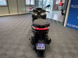 a motorcycle that is parked inside of a building