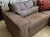 a couch that is sitting on the floor in the living room