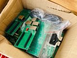 a cardboard box that has a computer inside of it