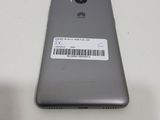 a close up of the back of a phone with a barcode on it