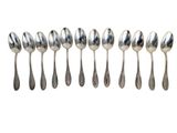 a set of six silver spoons and a spoon with a spoon handle