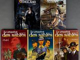 four books of comics are sitting on a table in front of a gray background