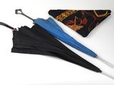 two umbrellas that are sitting next to each other on a table