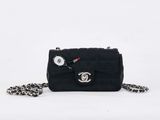 chanel black quilted mini flap bag