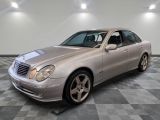 a picture of a mercedes s - class in a showroom
