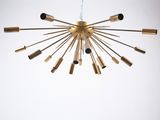 a large brass chandelier hanging from the ceiling