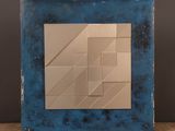 an image of a picture of a blue picture frame on a wooden table