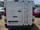 a white van that is parked in a lot