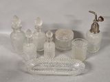 a lot of glass items that are sitting on a table