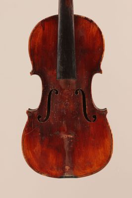 an old violin with a bow on a white background