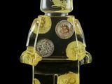 a lego man with a lot of coins in his hand