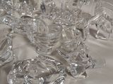 a lot of glass pieces that are on the table