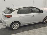a picture of a white car parked in a garage