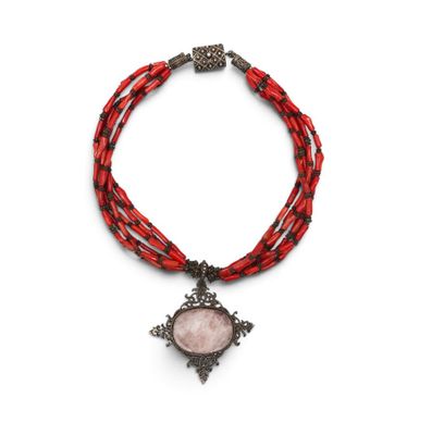 a red and black necklace with a cross pendant