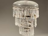 a chandelier hanging from the ceiling in a room