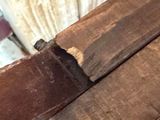 a piece of wood that has been cut in half