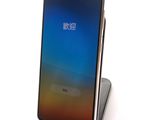 an image of a close up of a cell phone on a stand