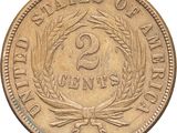 a close up of a coin on a white background