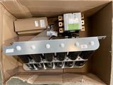 a cardboard box with a bunch of electrical equipment inside of it