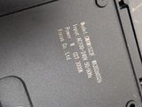 a close up picture of a laptop with a hard drive