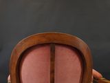 an antique wooden chair with pink upholstered upholstered upholstered upholstered upholstered