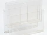 a clear plastic magazine holder on a white background