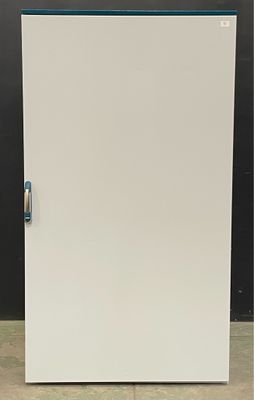 an image of a white cabinet with a blue door