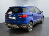 the rear end of a blue ford eco - pace parked in a showroom