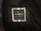 a close up of a label on a black jacket