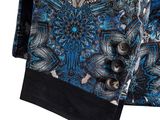 a close up of a blue and black shirt with a pattern on it