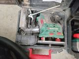 a tool box with tools in it sitting on the floor