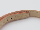 an image of a close up of a leather belt on a white surface