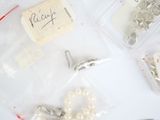 a lot of beads and other items that are on the table