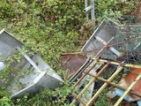 a pile of junk that is sitting on the side of the road