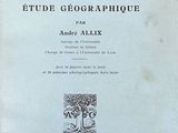 an old book with a picture of a tree on it