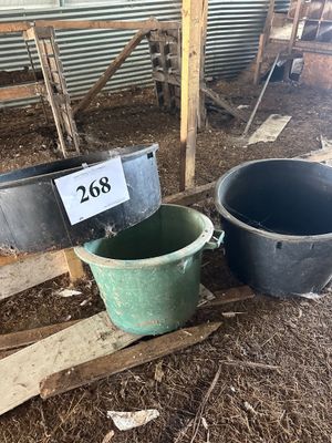 two buckets that are sitting next to each other
