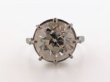 a diamond ring on a white background