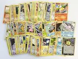 a lot of pokemon cards on the table together