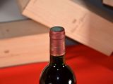 a bottle of wine that is sitting on a table