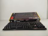 a keyboard and a mouse sitting on top of each other