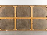 an image of a large wooden box with a metal frame