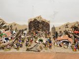 a lot of figurines that are sitting on the floor